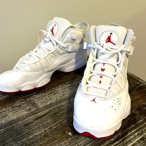 Red and white Nike Jordan’s size 7. 1/2 very clean only worn once